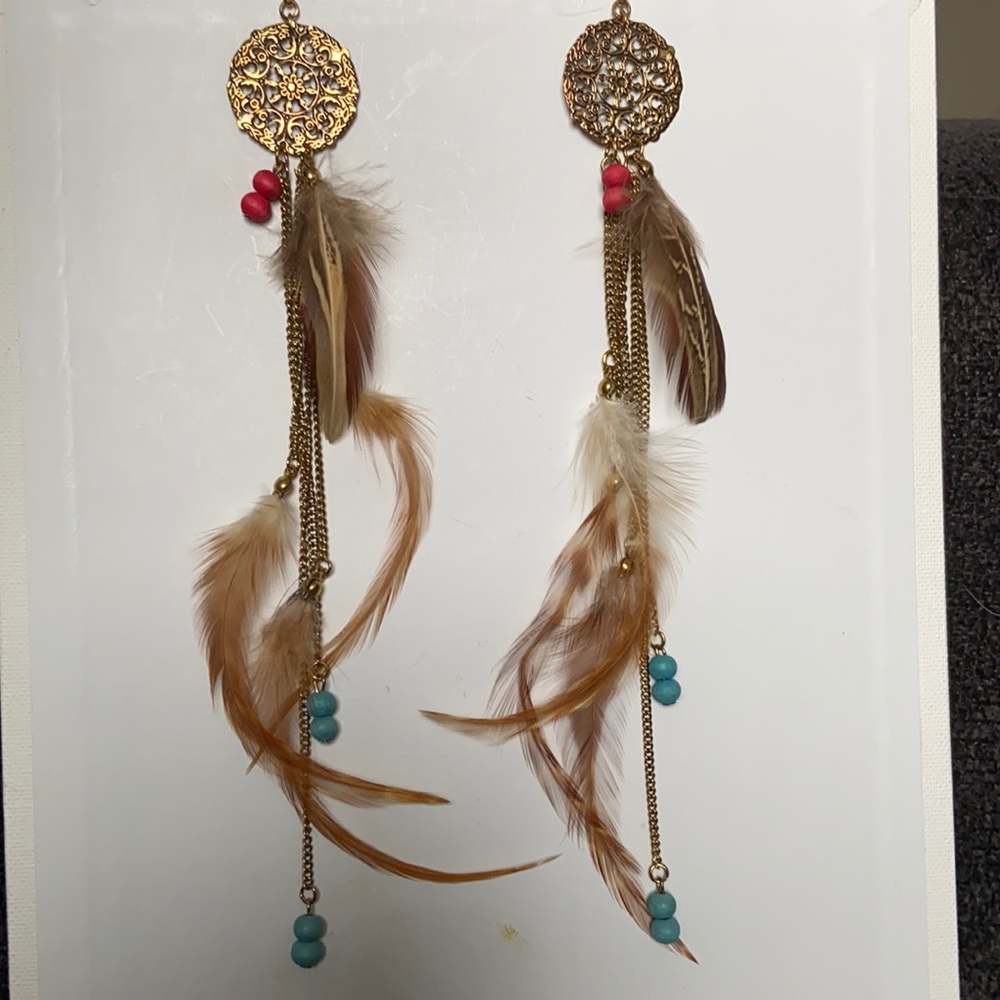 Long, feathered earrings